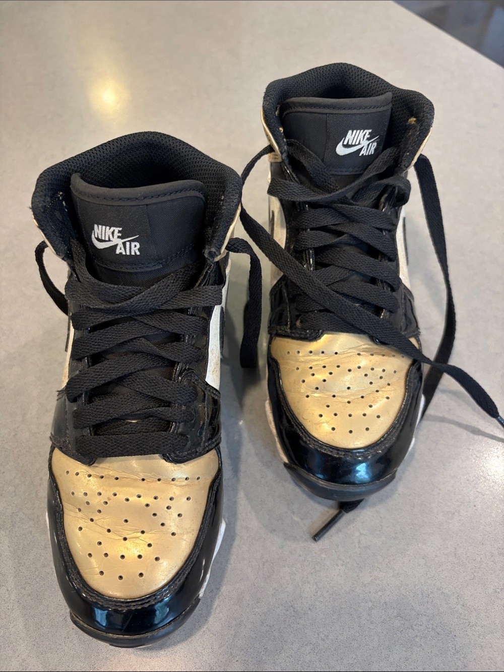 Nike Kids High-Top Sneakers in Black and Gold